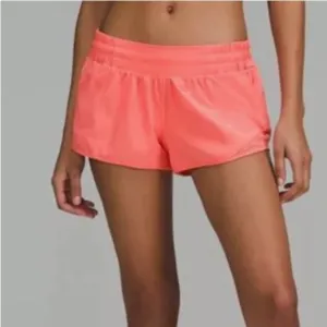 Lululemon hotty hot low rise HR coral pink orange shorts 4” lined