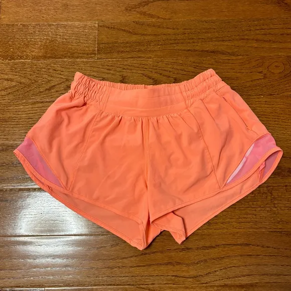 Lululemon hotty hot low rise HR coral pink orange shorts 4” lined