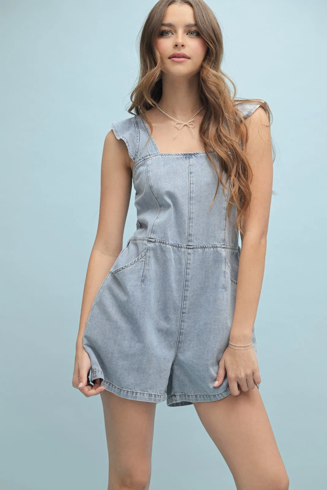 The Leila Ruffle Sleeve Denim Romper
